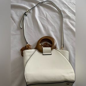 White and wooden pocketbook